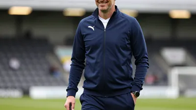 Caernarfon Town manager Richard Davies signs a new contract extension until 2029, following a period of unprecedented...