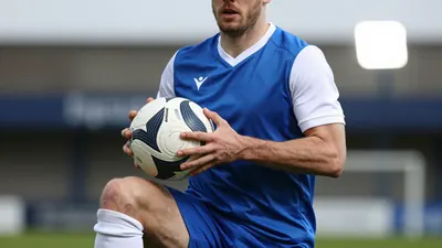 Caernarfon Town faces off against Colwyn Bay in a highly anticipated Cymru Premier derby match
