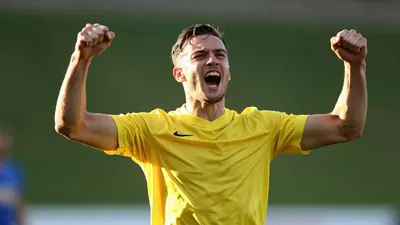 Caernarfon Town moved to fifth in the Cymru Premier after a thrilling 5-3 win over Holywell Town, with Zack Clarke...